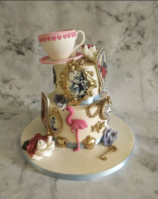 Wedding cake with teacup and golden details