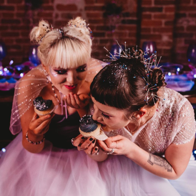 Bridesmaids covered in glitter eating cupcakes